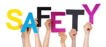 Many Caucasian People And Hands Holding Colorful  Letters Or Characters Building The Isolated English Word Safety On White Background